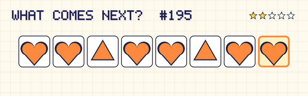 The finished pattern: orange heart, orange heart, orange triangle, orange heart, orange heart, orange triangle, orange heart, orange heart.